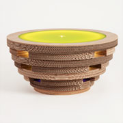 Tappo: tavolino multifunzionale con fonte luminosa a LED e punto di ricarica per computer e mobile devices. In cartone, legno con piano in metacrilato verde lime. Design: Caporaso per Lessmore